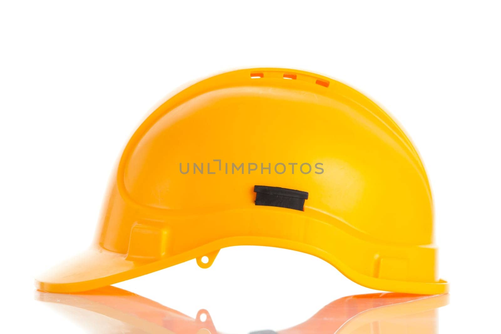 Yellow safety helmet on white background. hard hat isolated on white
