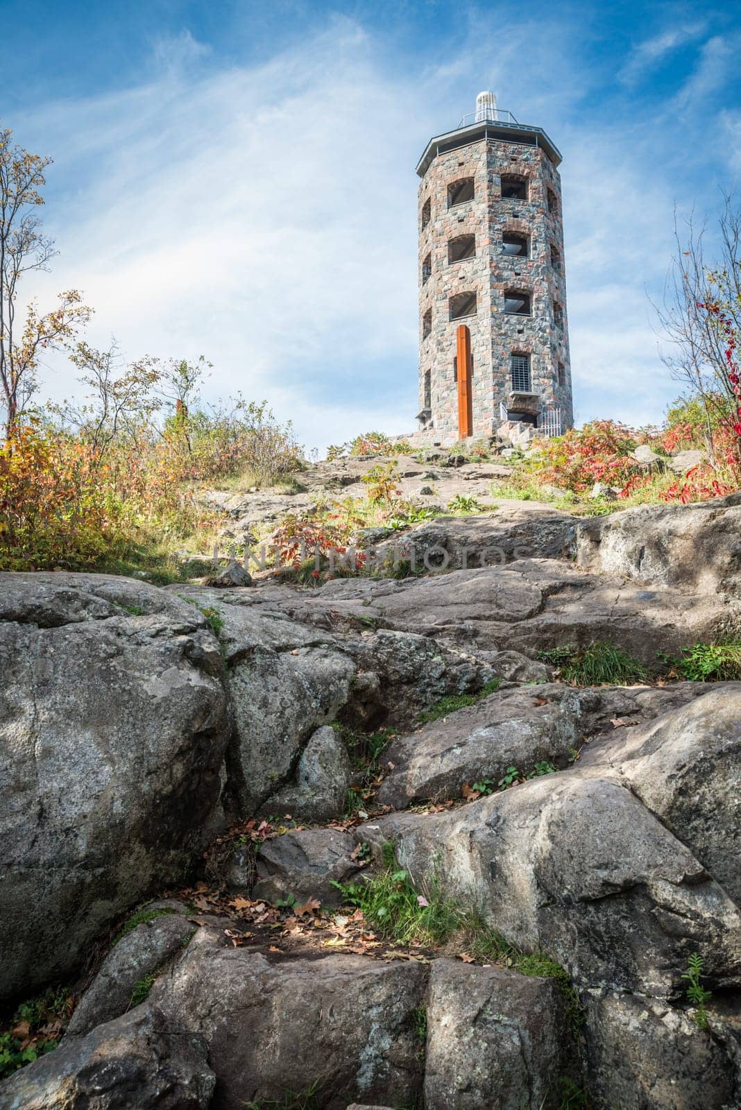 Stone tower in a public park during fall time