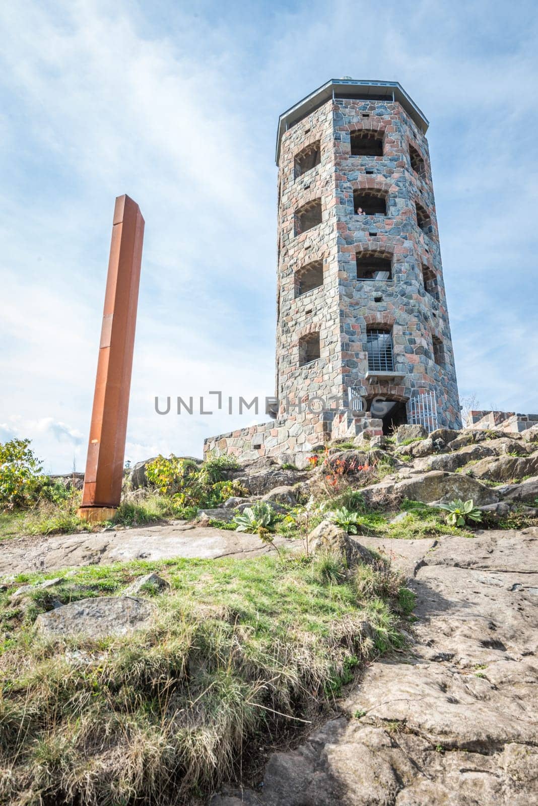 Public stone viewing tower during a sunny day