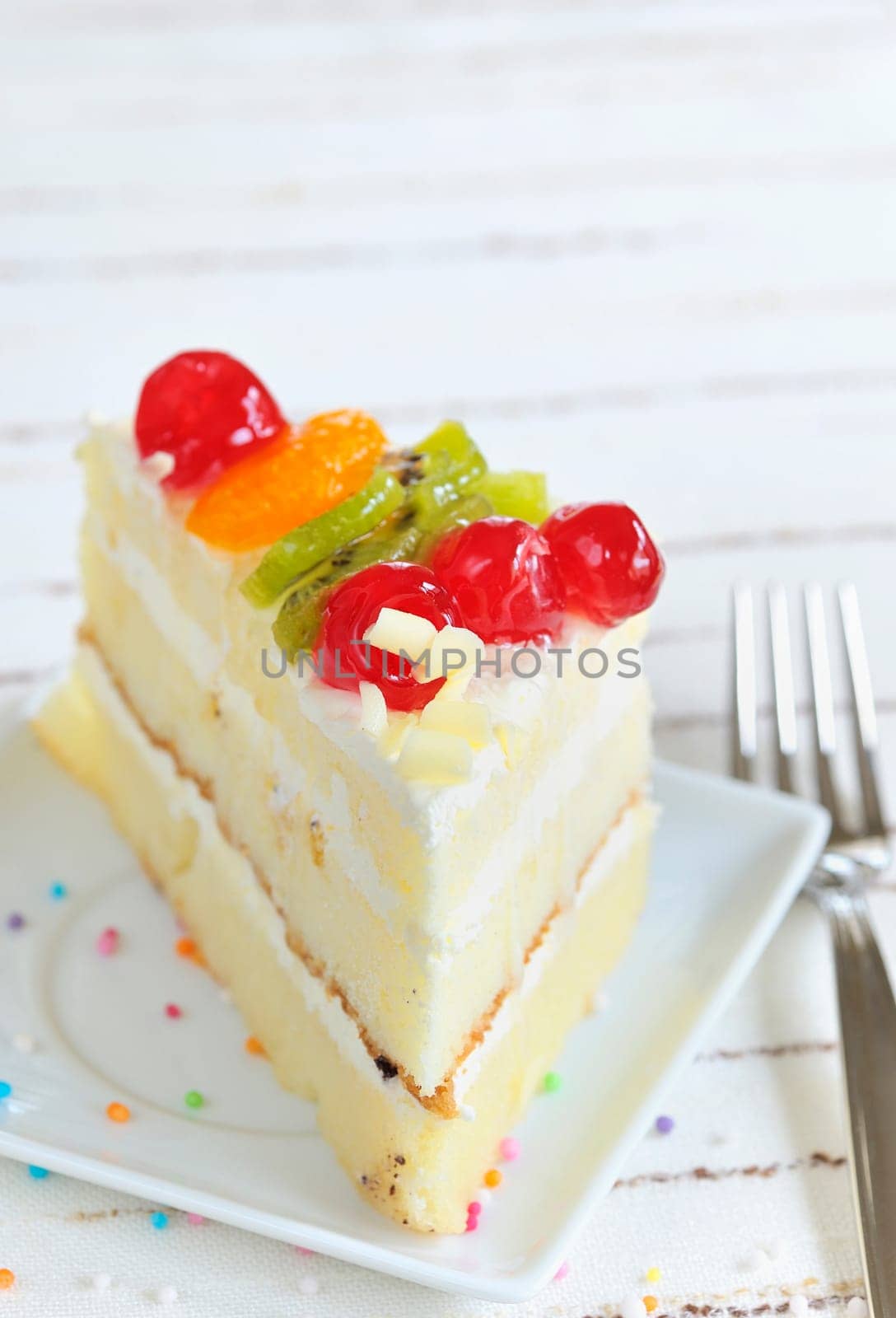 piece of delicious cake on white background