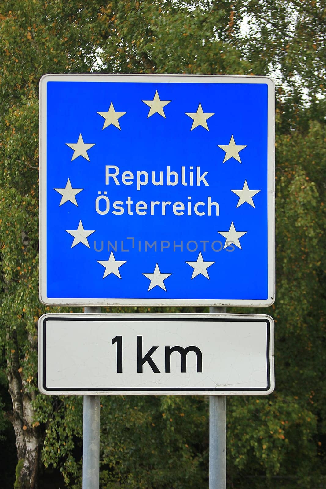 Traffic sign "Republic of Austria 1km"",Bavaria,Germany"