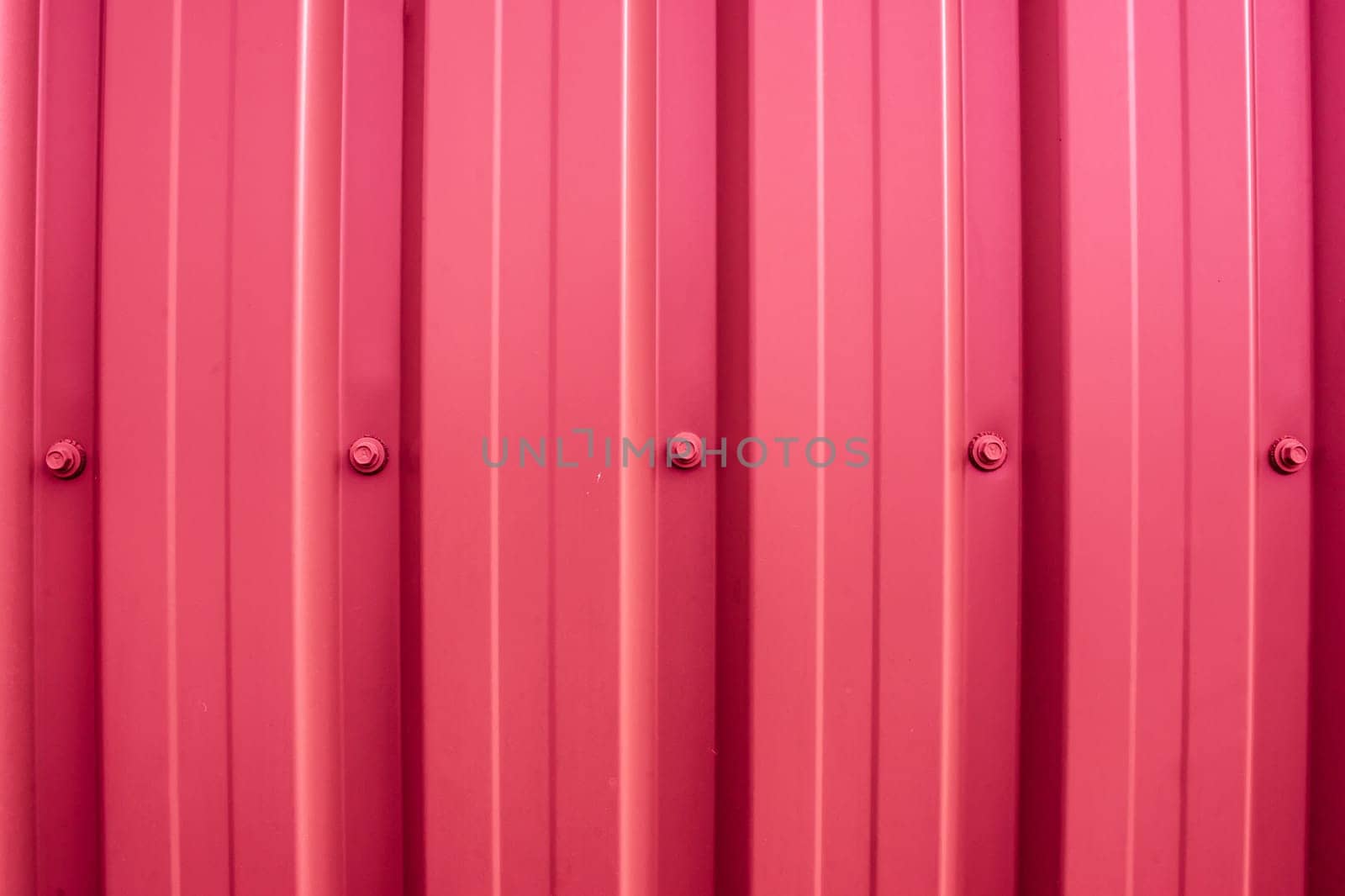Colorful plastic wall with iron nuts