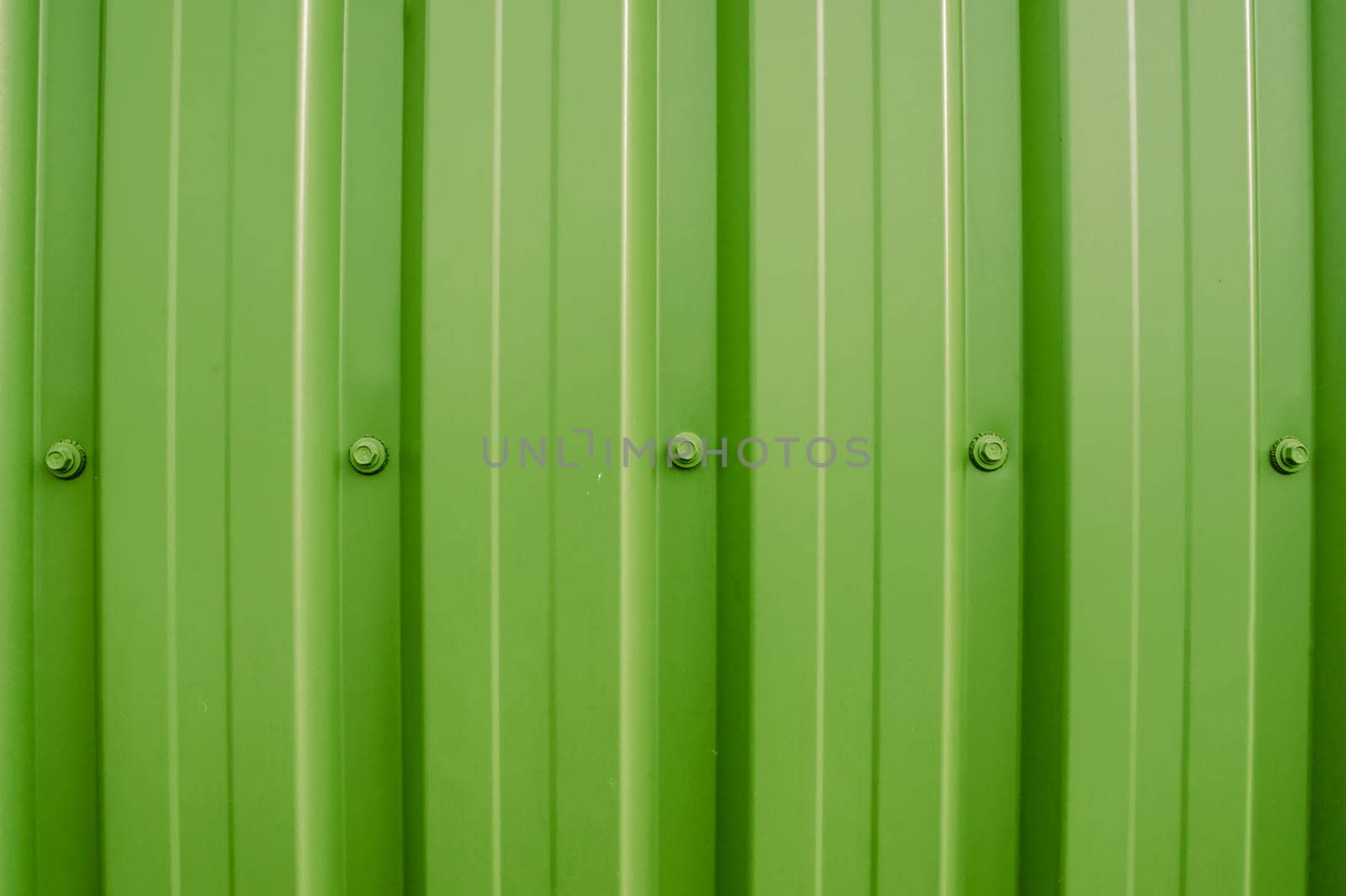 Colorful plastic wall with iron nuts