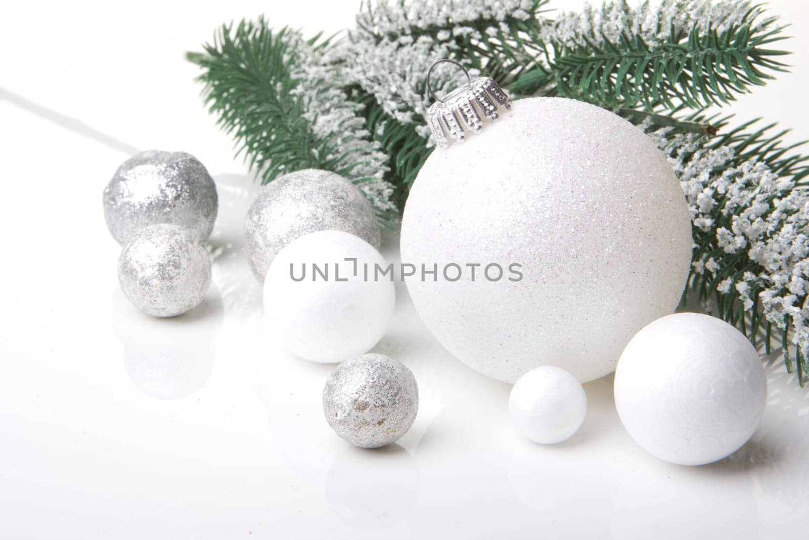 Christmas,decoration with fir branch,pine cone,Christmas bauble silver and white
