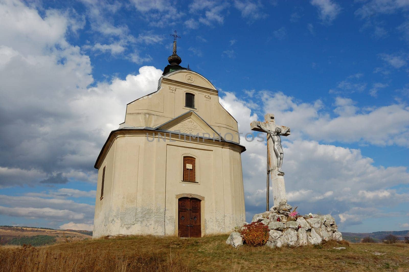 Chapel with cross on hill