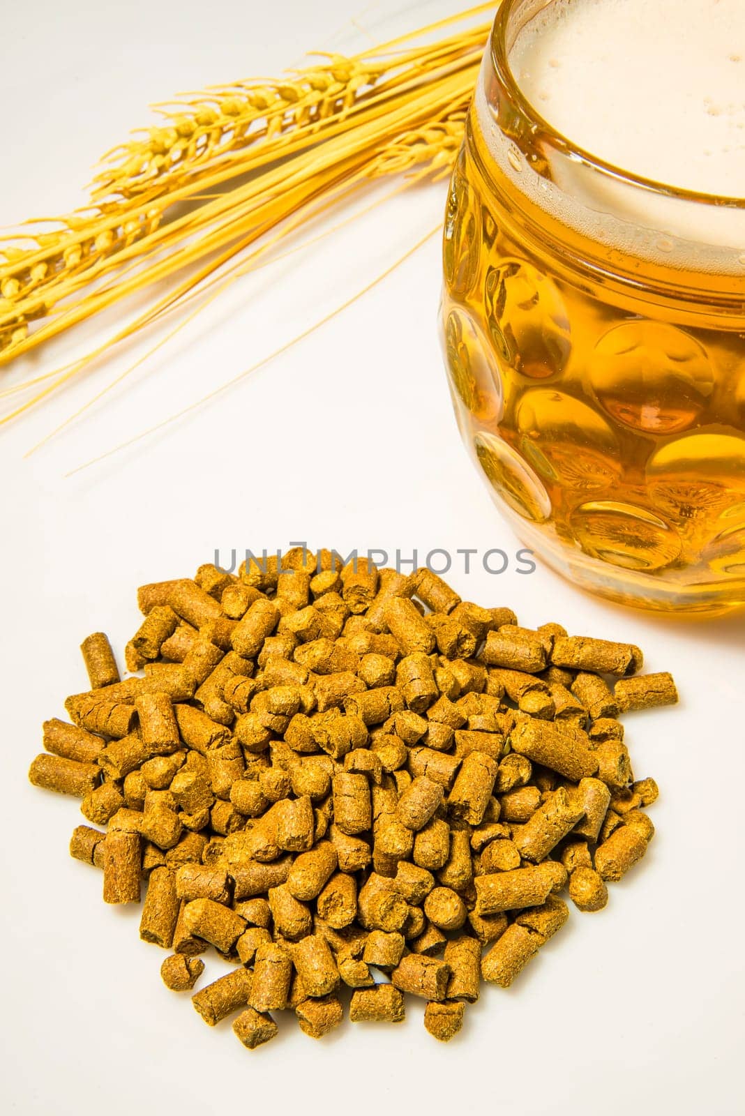 Hop pellets with beer glass
