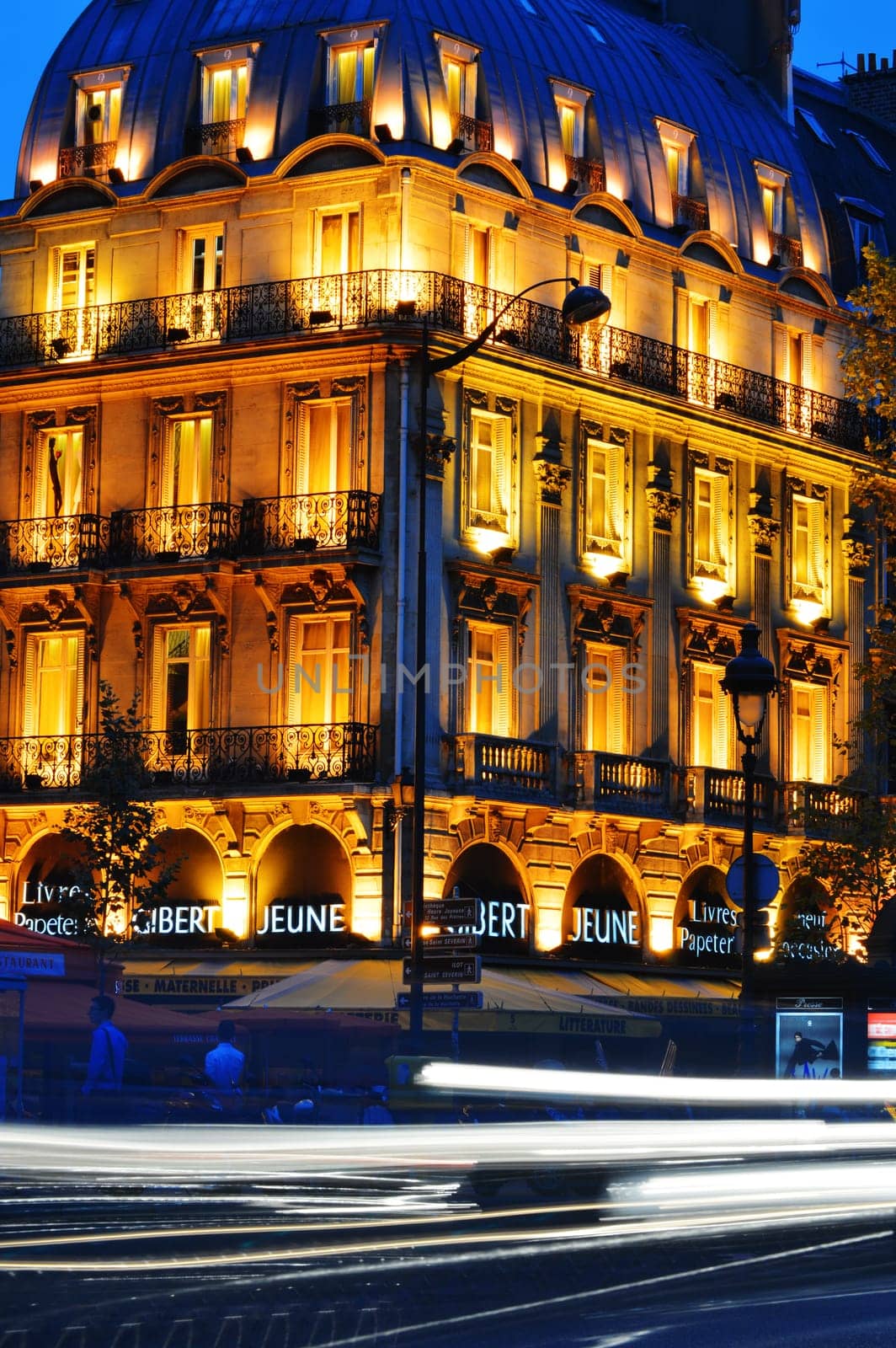 Paris by night on famous Boulevard Saint-Michel near Latin Quarter