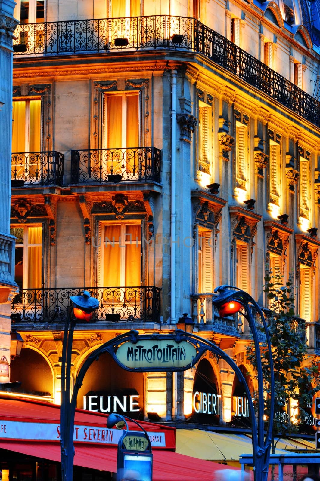 Paris by night on famous Boulevard Saint-Michel near Latin Quarter