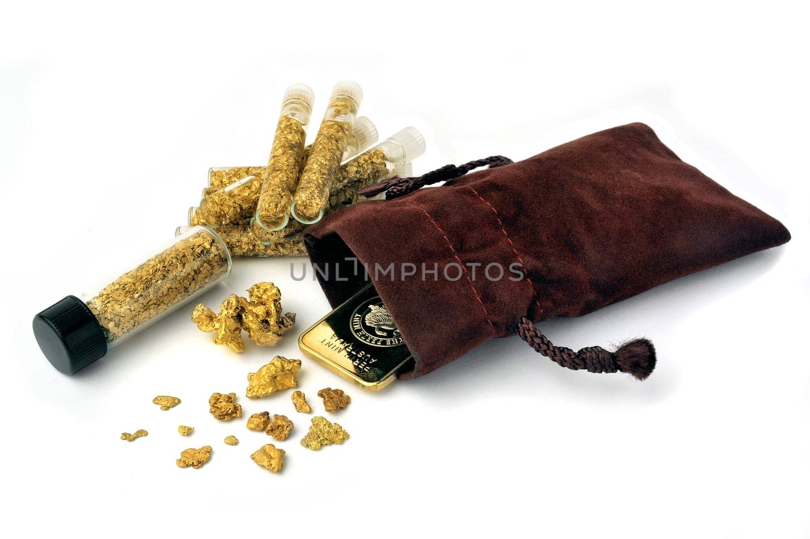 nuggets and gold bullion in studio on white background