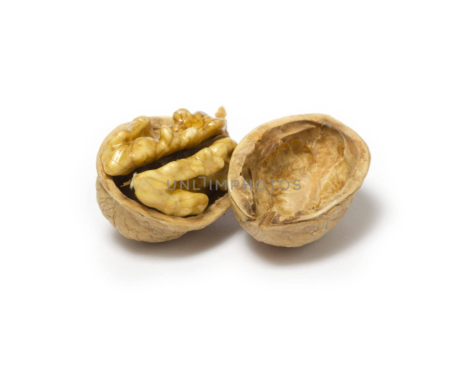 Close-up of a walnut against white background