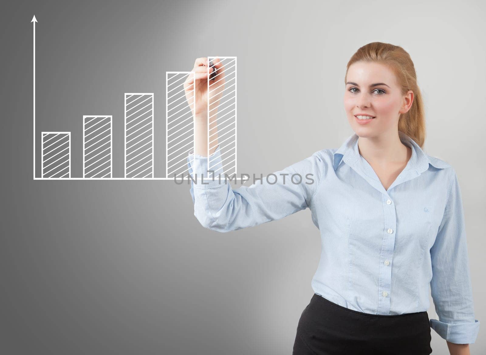 business woman hand drawing a graph, grey background