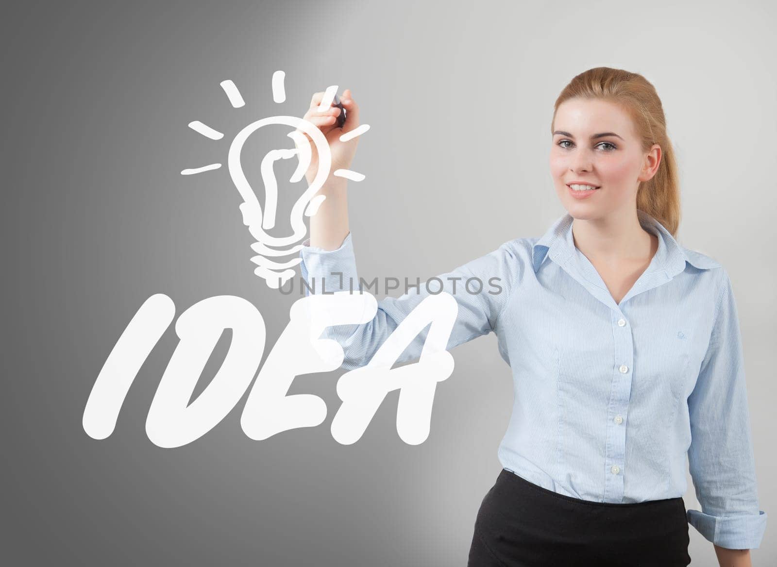 Handwritten html 5 by businesswoman on glass