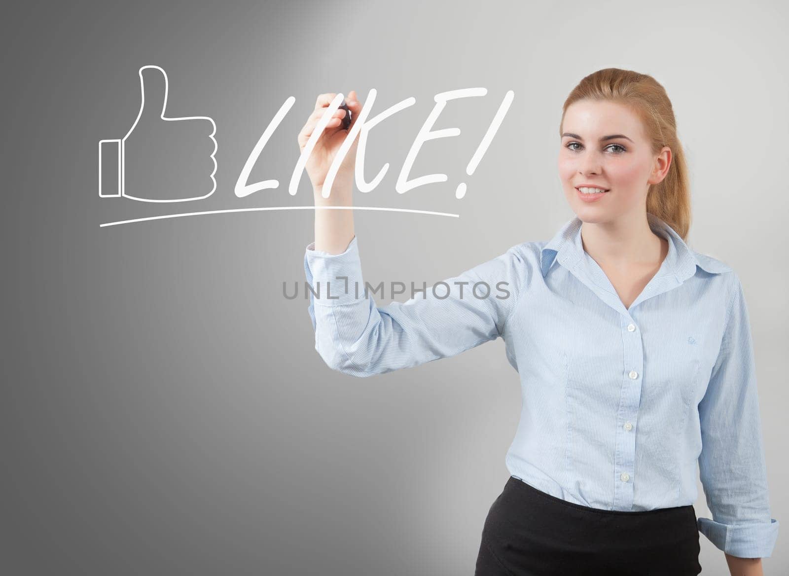 businesswoman write like on presentation glass, grey background