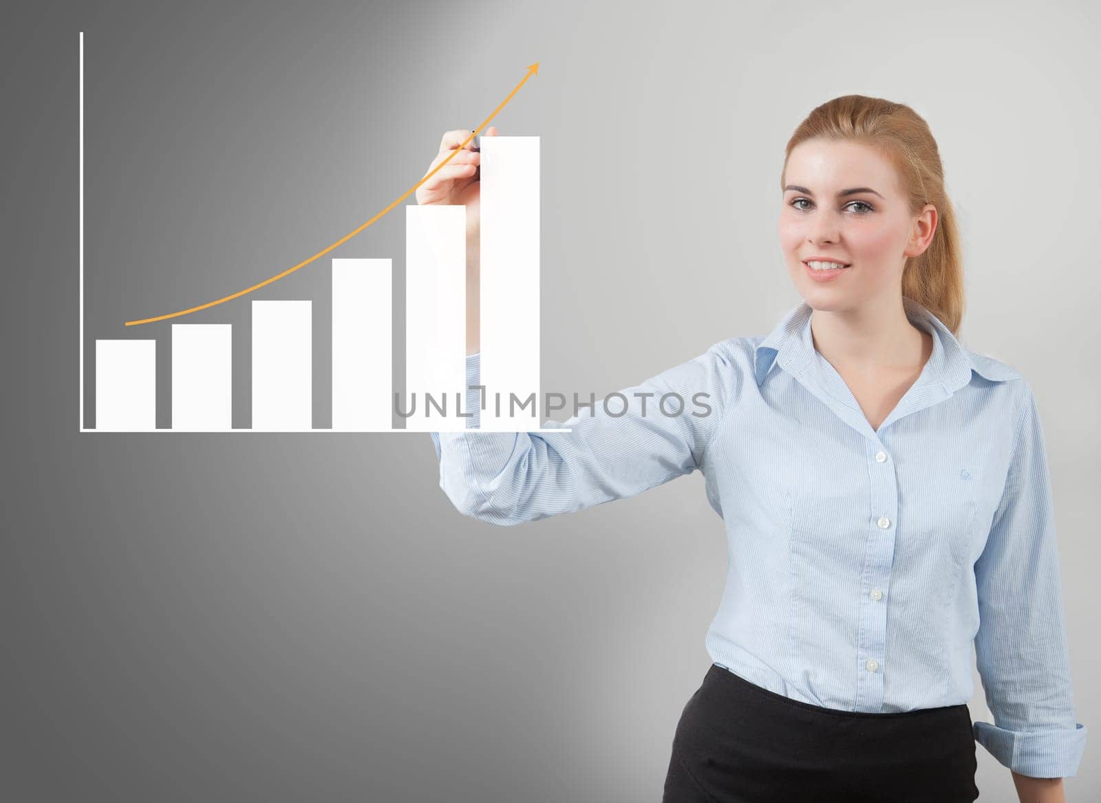 Handwritten chart by businesswoman on glass