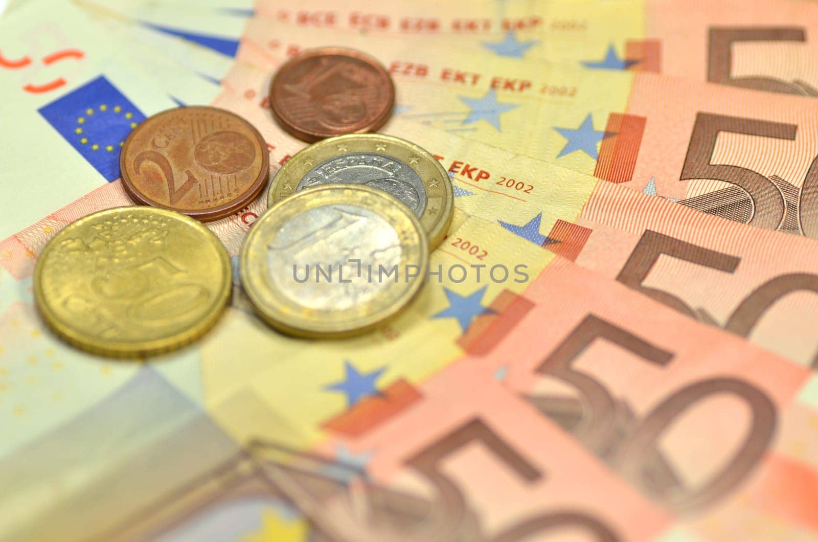 euro banknotes and coins