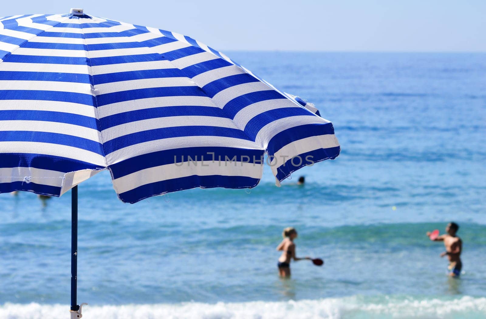 Mediterranean beach during hot summer day