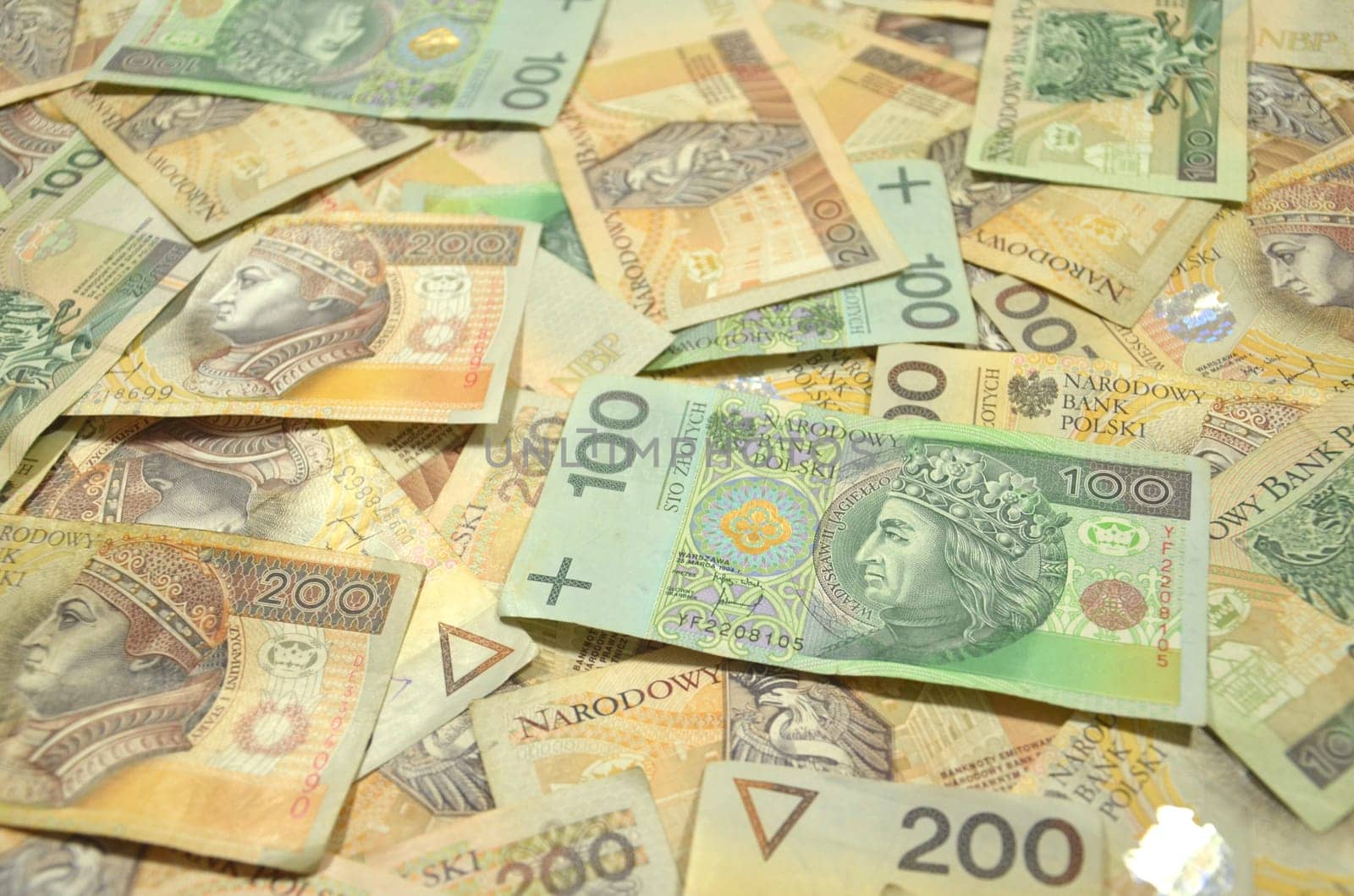 one and two hundred zloty banknotes from poland