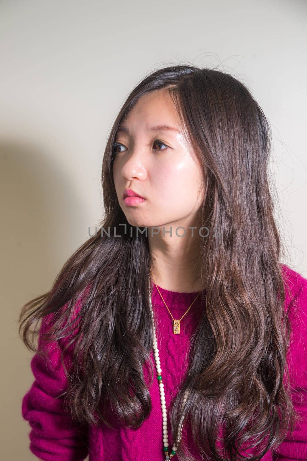 Portrait of young woman looking stressed out