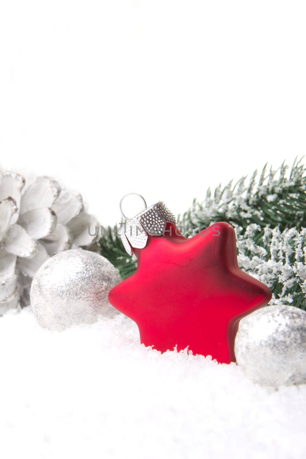 Christmas,decoration with fir branch,pine cone,Christmas bauble as a star red and white