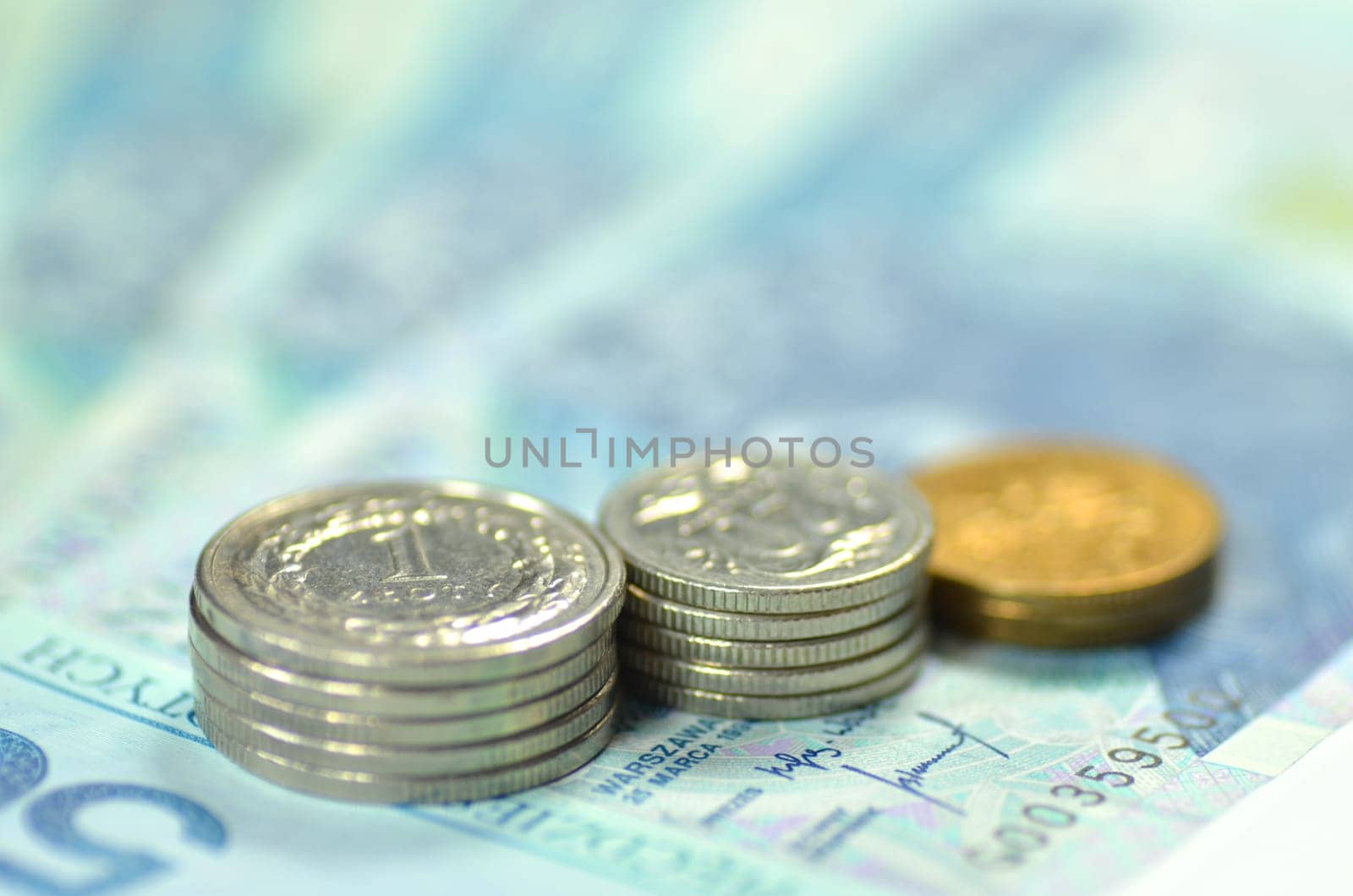 zloty banknotes and coins from poland