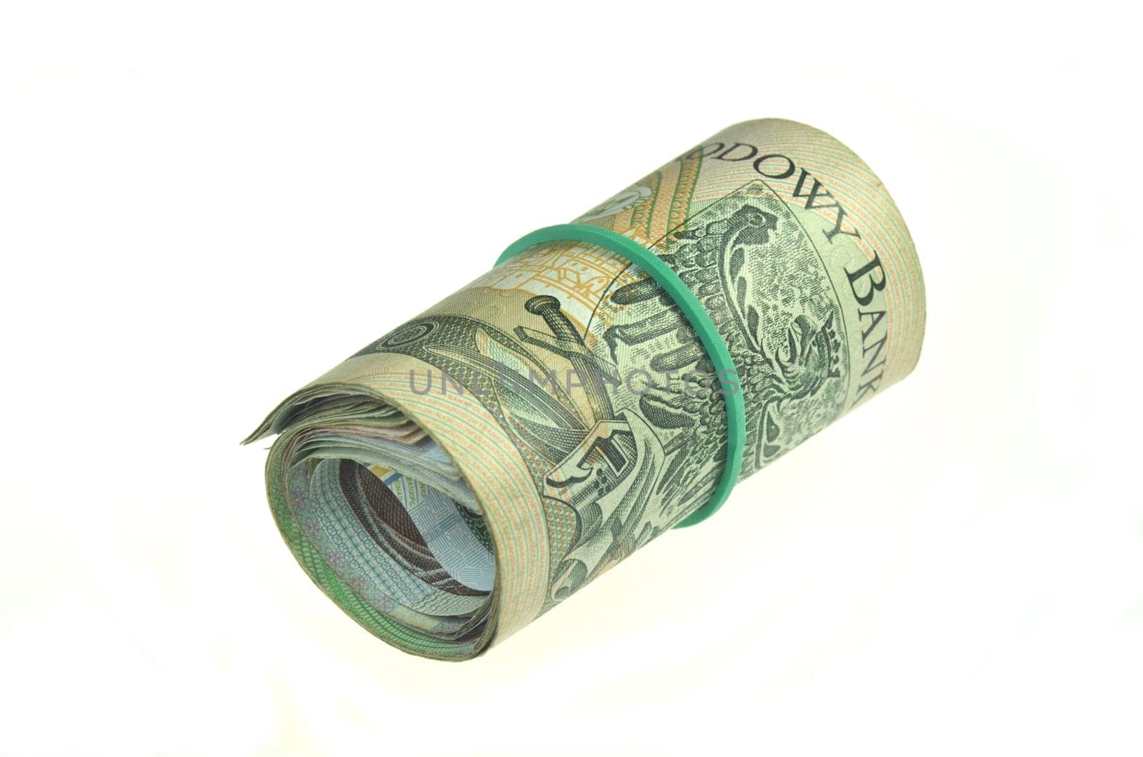 roll of polish banknotes isolated on white