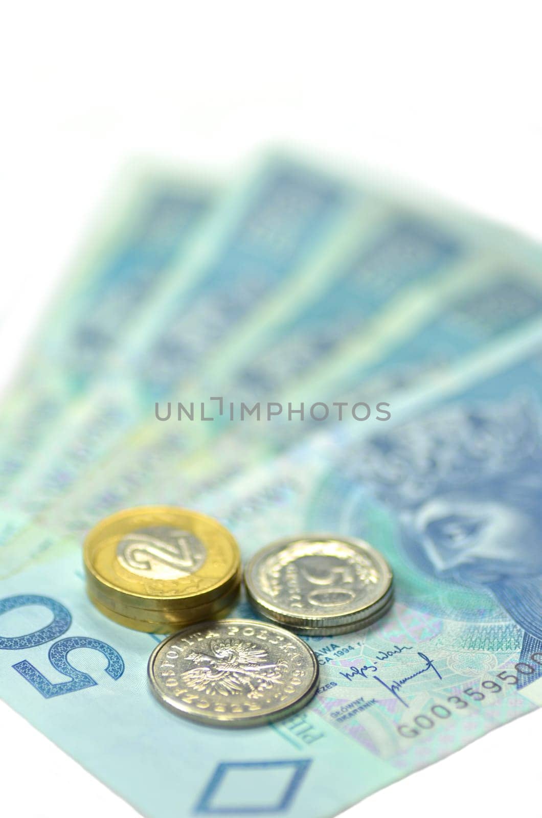 zloty banknotes and coins from poland