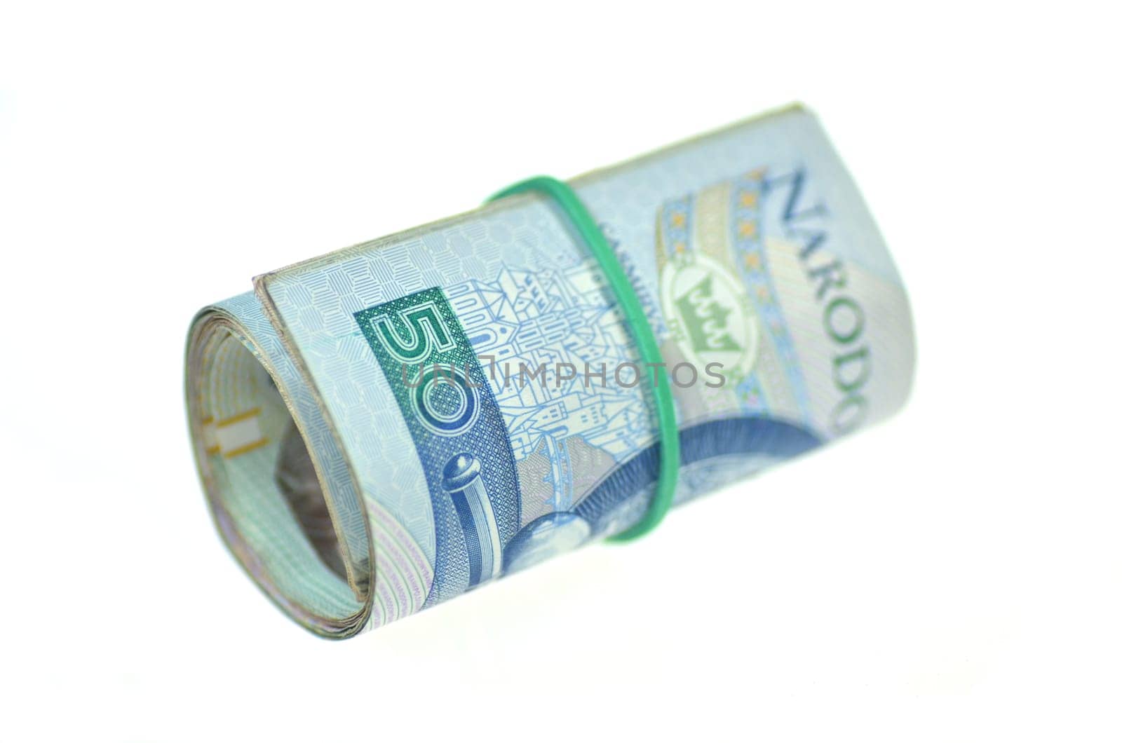 roll of polish banknotes isolated on white