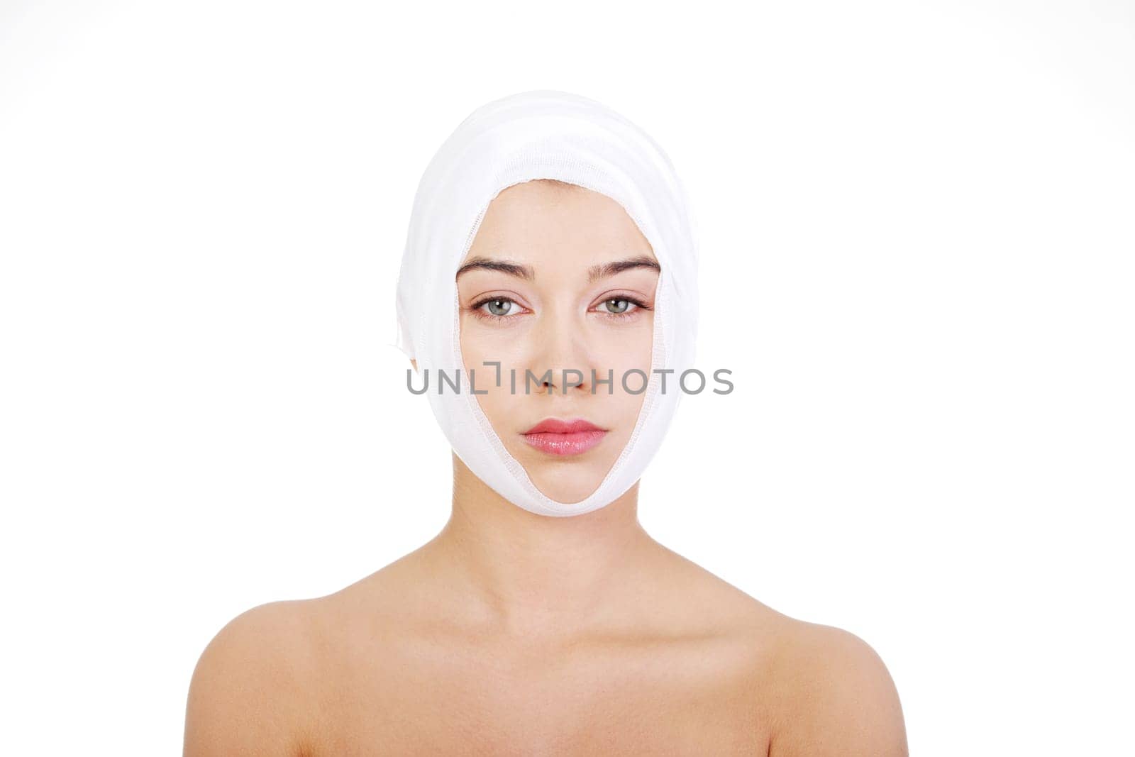 portrait of beautiful young female face with bandage - beauty treatment plastic surgery