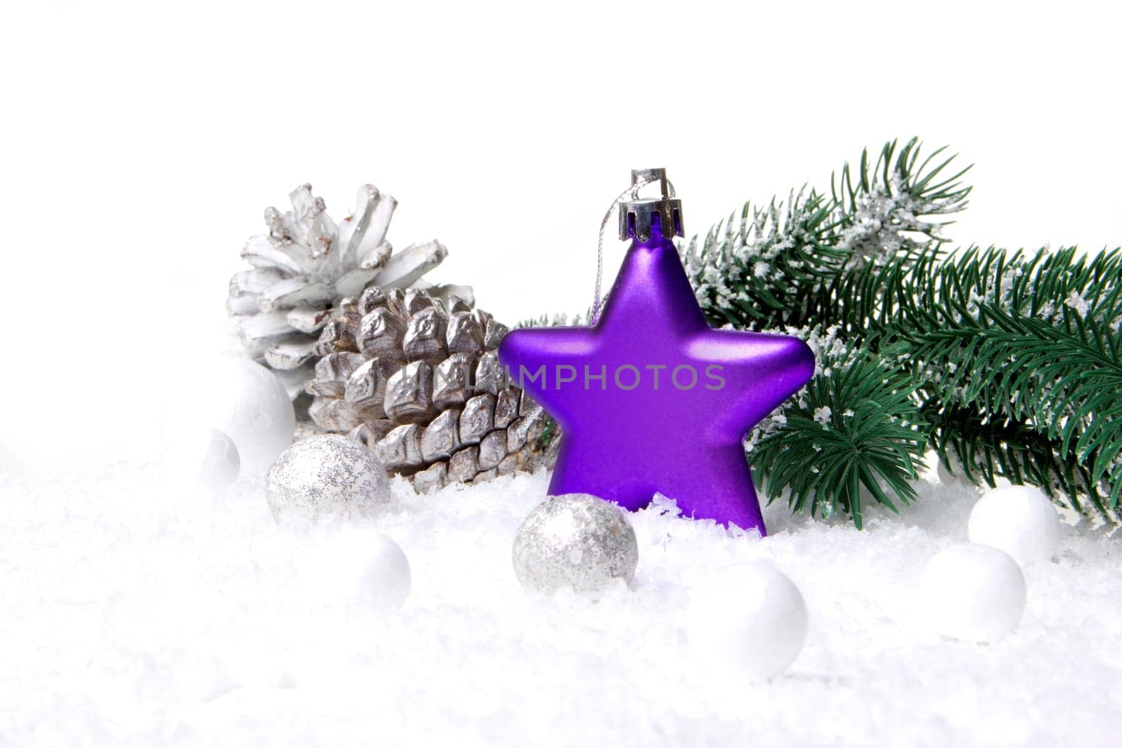 Christmas,decoration with fir branch,pine cone,Christmas bauble as a star purple and white
