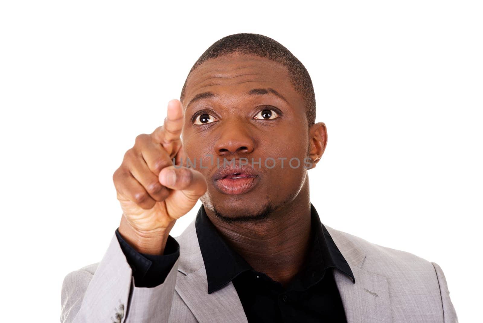 handsome male businessman pointing high. isolated on white.