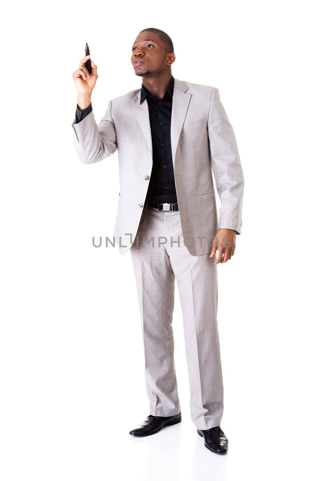 male businessman points high with pen. vertical. isolated on white.
