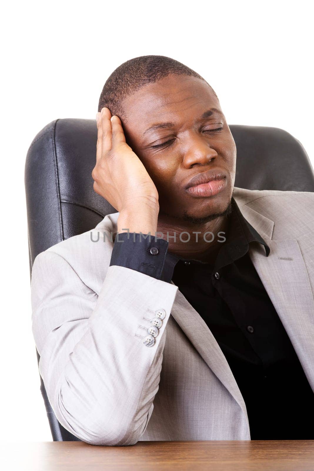 male businessman sitting,bored,sleeping. isolated on white.