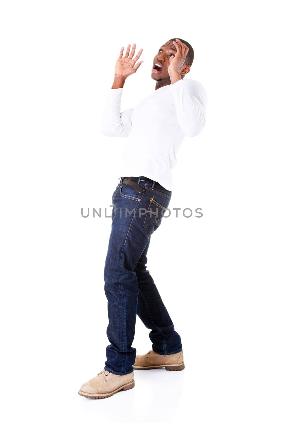 handsome young man standing,scared. isolated on white.