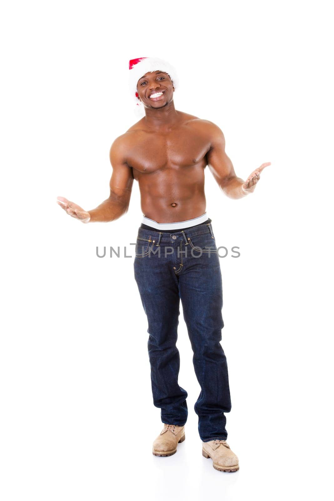 handsome man with spread hands and santa hat. isolated on white.