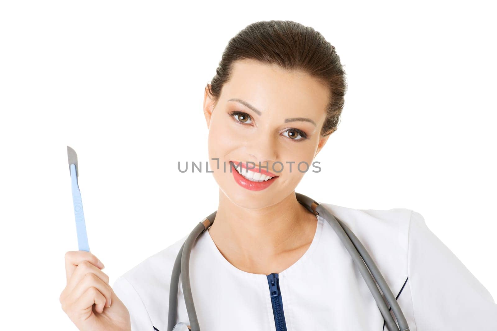 attractive young female doctor with scalpel. isolated on white.