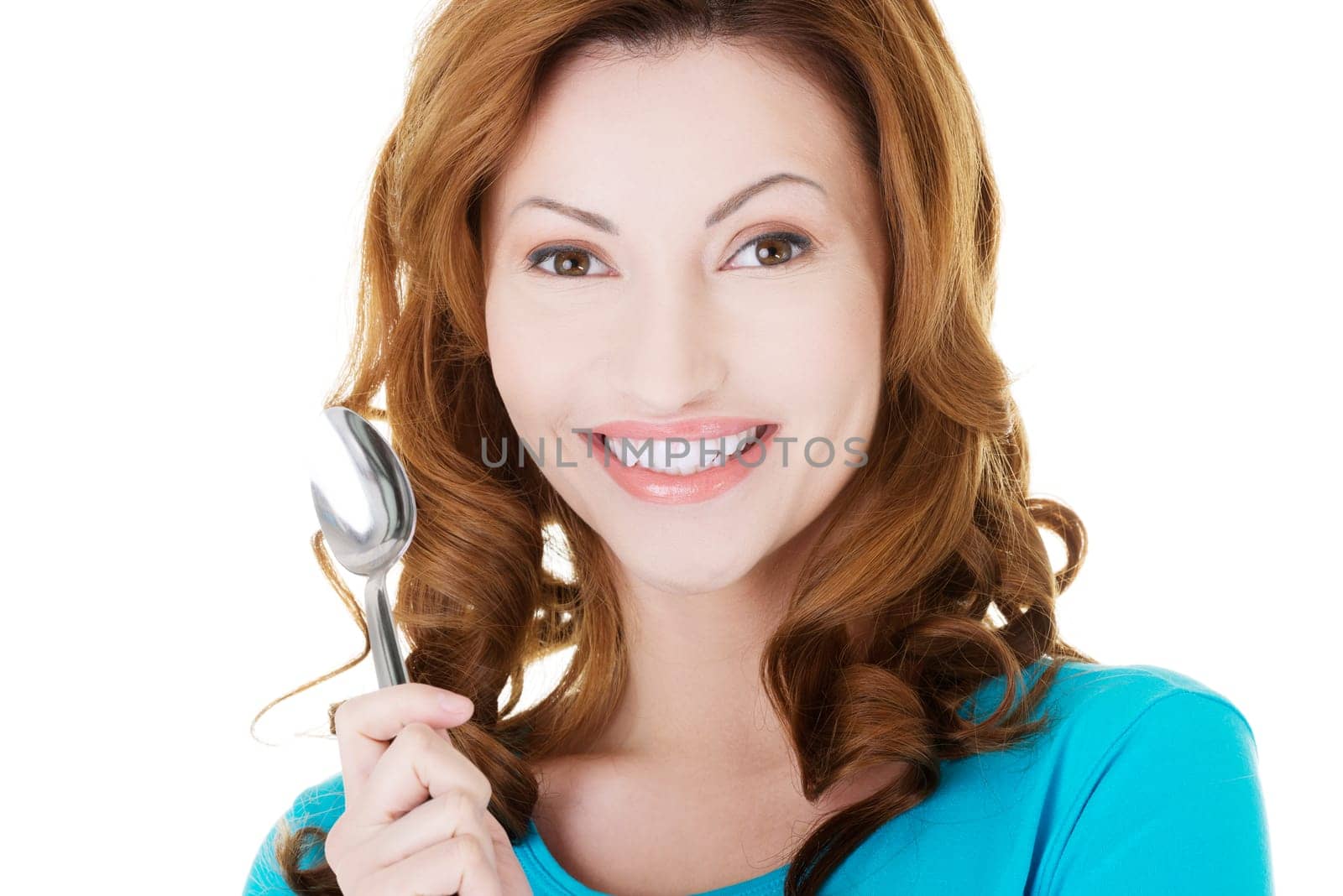 beautiful woman holding a spoon. isolated on white.