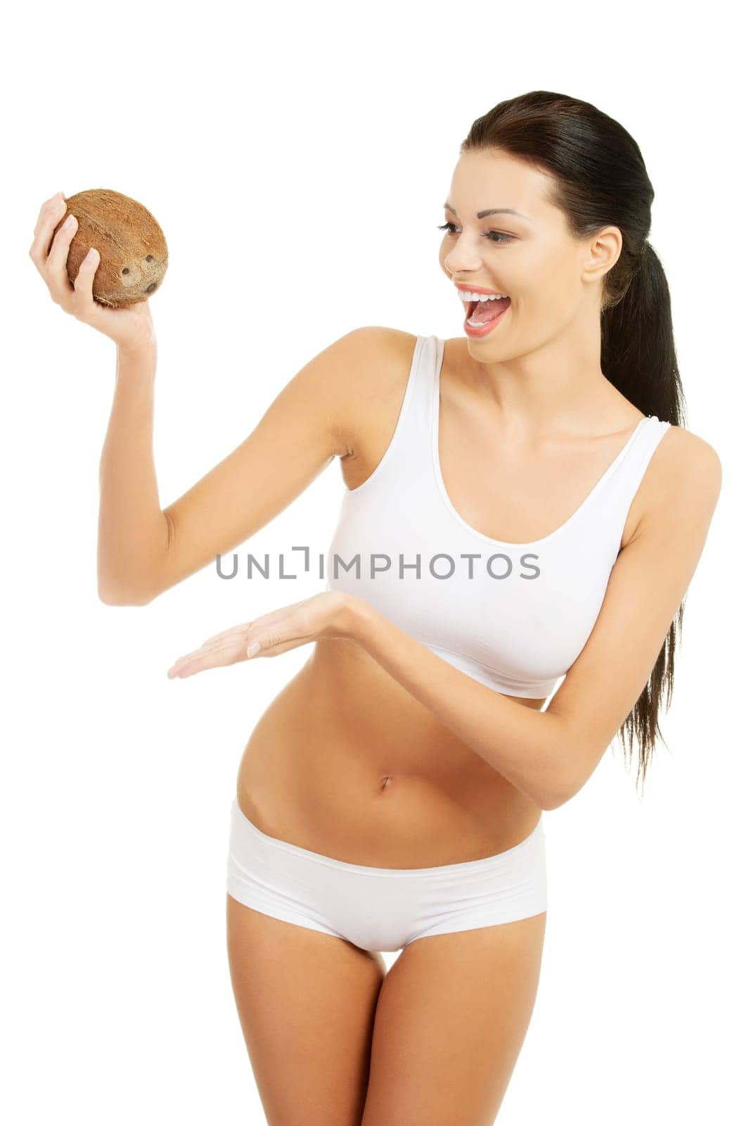 attractive beautiful woman holding cocnut. isolated on white.
