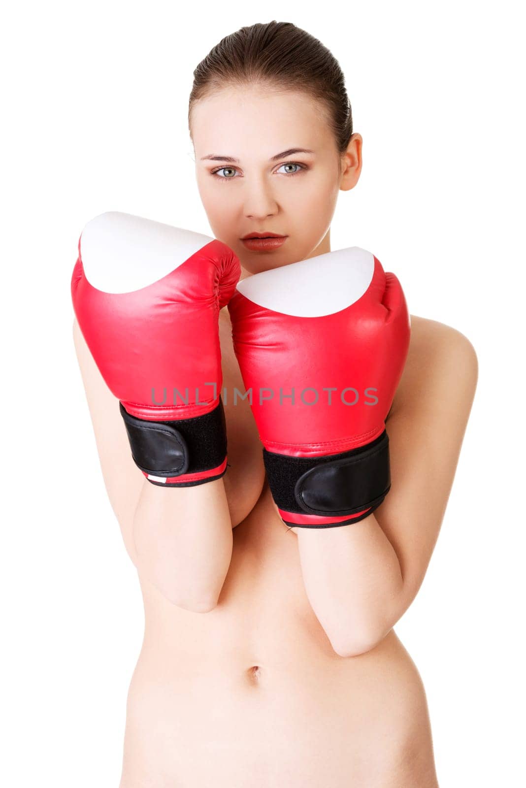 attractive naked woman with boxing gloves. isolated on white.