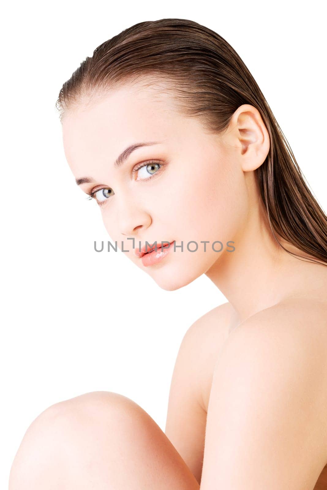 attractive naked caucassian woman's portrait. isolated on white.