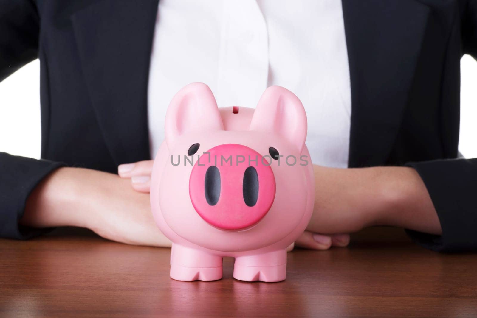 close up on a piggy-bank put on the table.