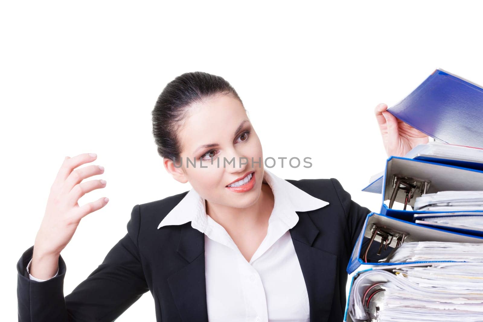 business woman with stack of binders. isolated on white.