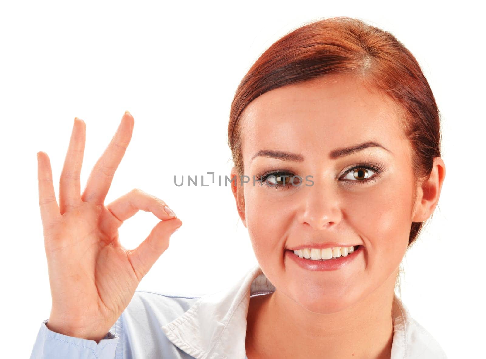 Young woman showing ok gesture isolated on white