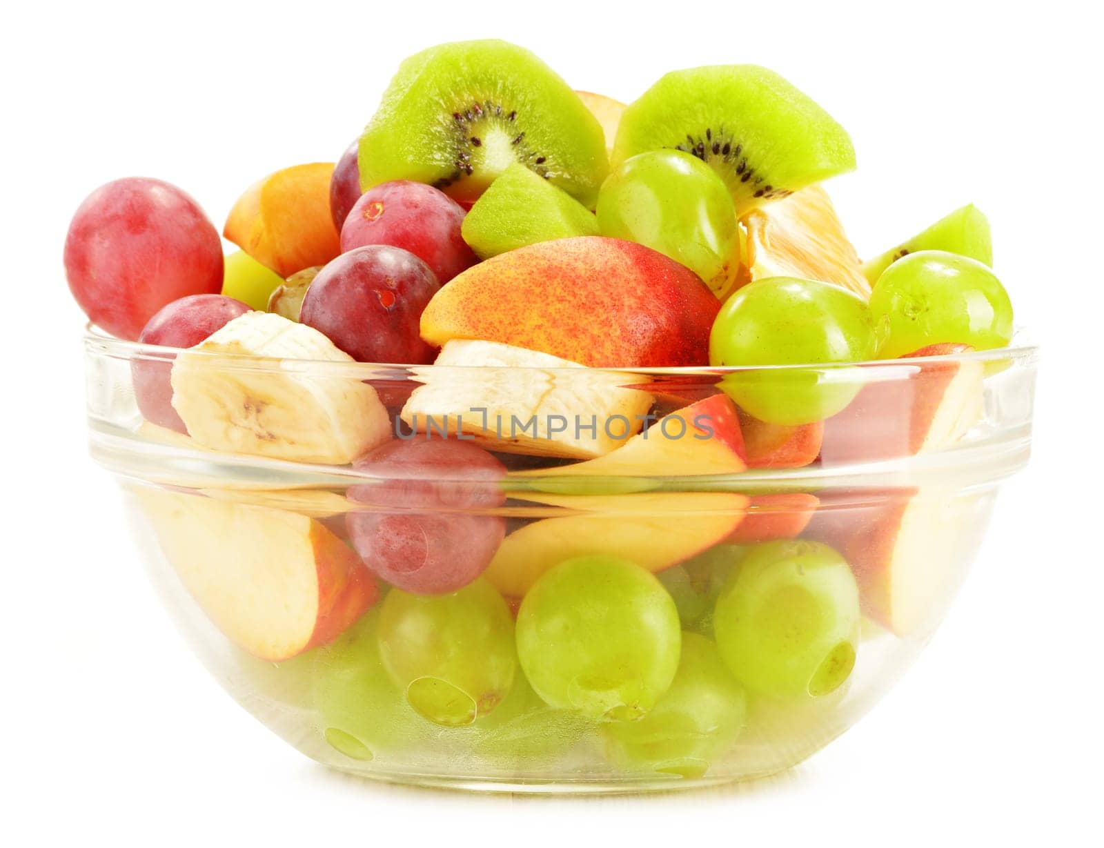Fruit salad bowl isolated on white