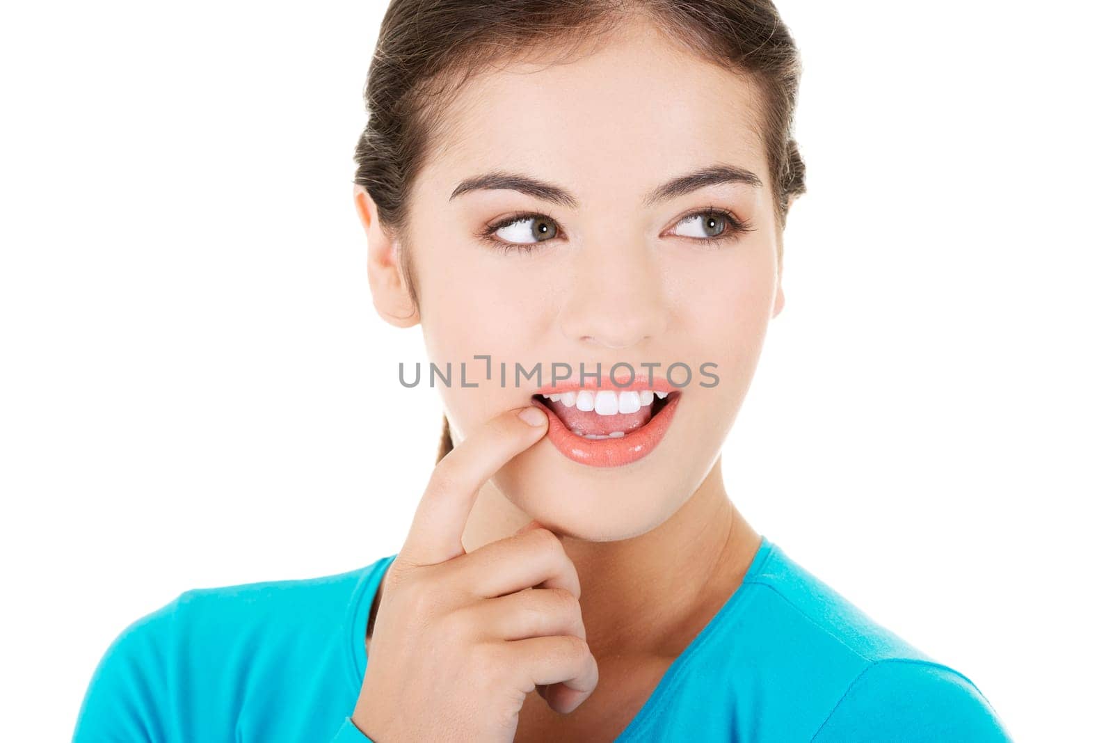 attractive woman's face with a smile on her lips. isolated on white.