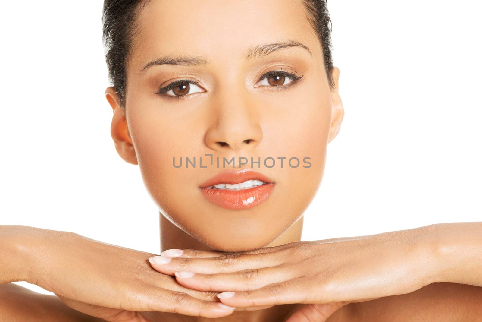 portrait of attractive women proping her head. isolated on white.