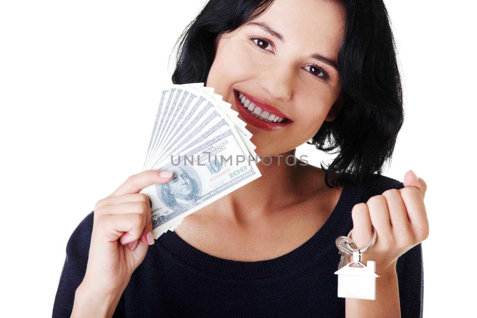 attractive girl with money and house on hands. isolated on white.