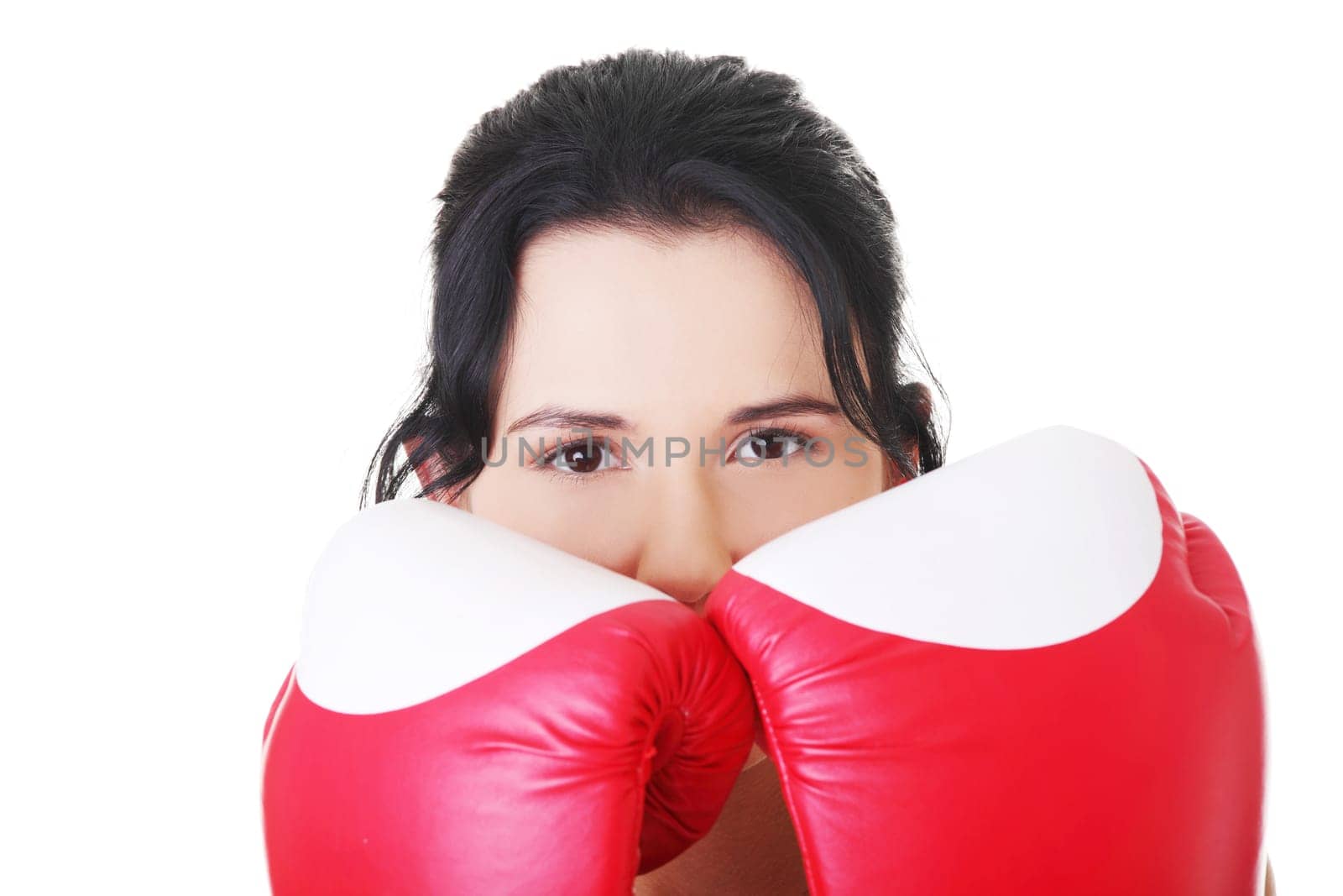 attractive young woman with boxing gloves. closeup. isolated on white.