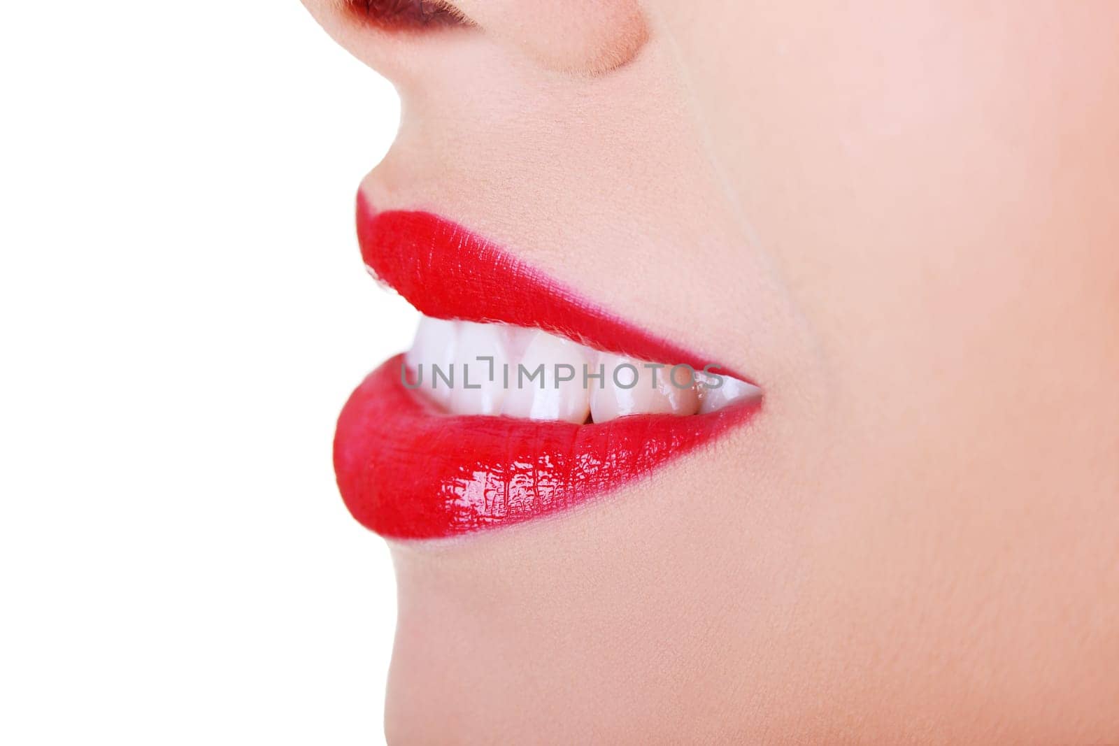female's red lips. close up. isolated on white.