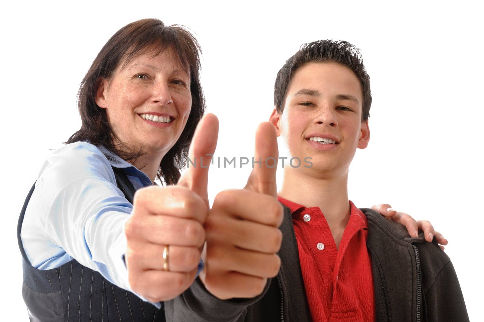 Mother and son get along splendidly and make a "thumbs up"" gesture together in front of a white background."