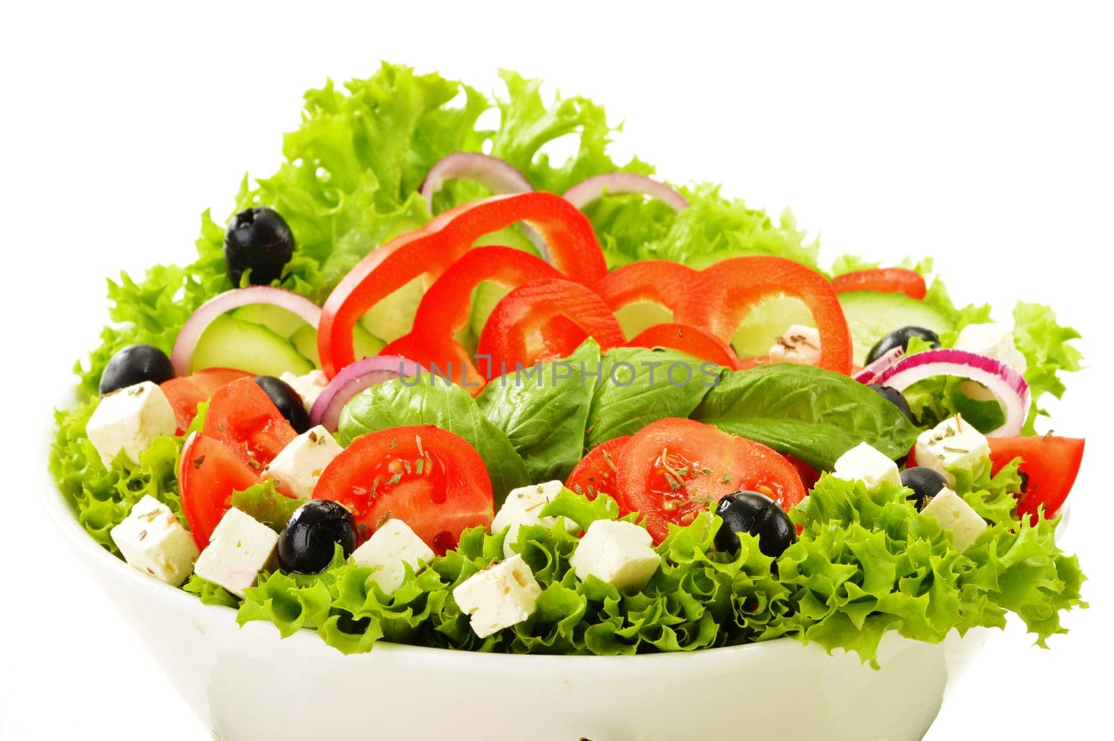 Vegetable salad bowl isolated on white background